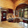 arched log walls in kitchen